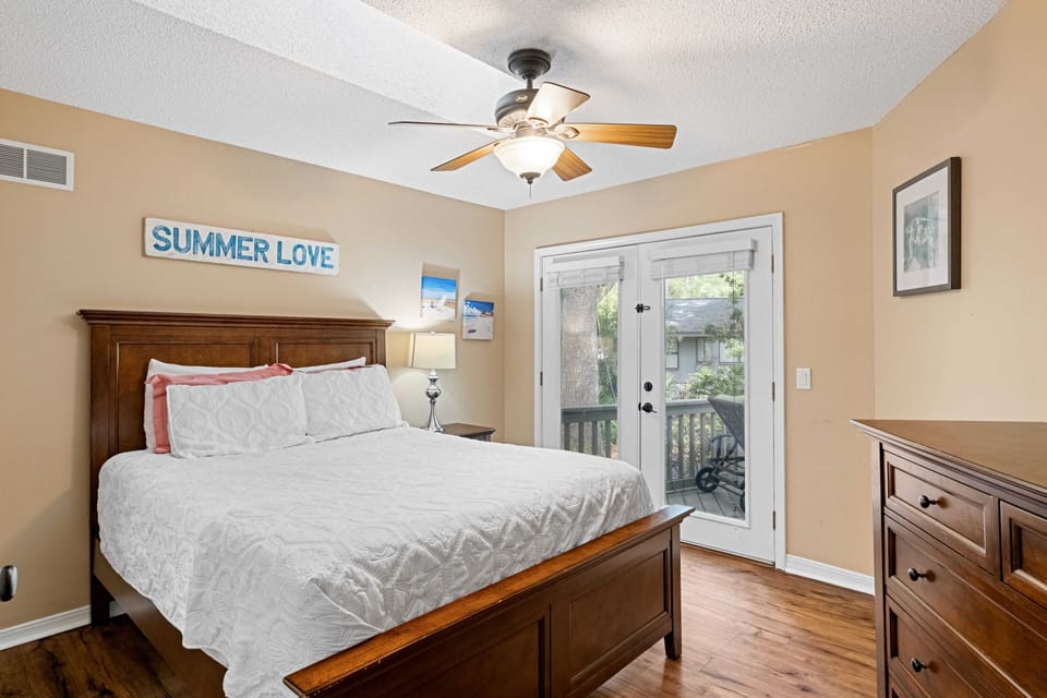 Queen bedroom with deck walk out