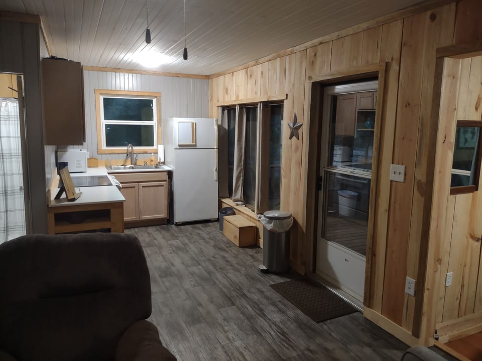 The full kitchen looks out towards the river