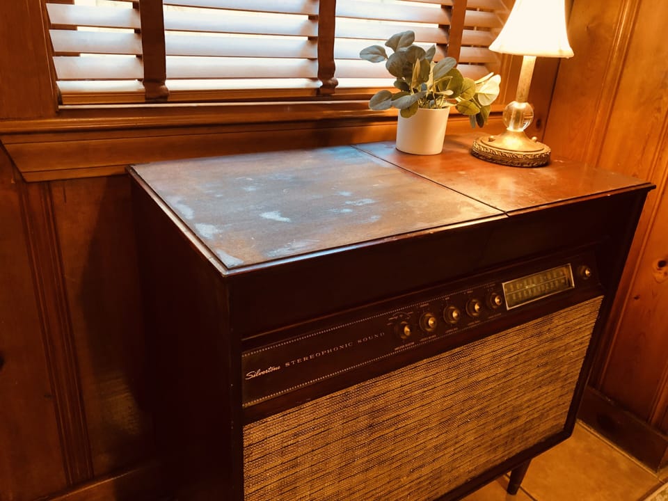 Another view of the 1960's Silvertone tube-amplified console radio. 