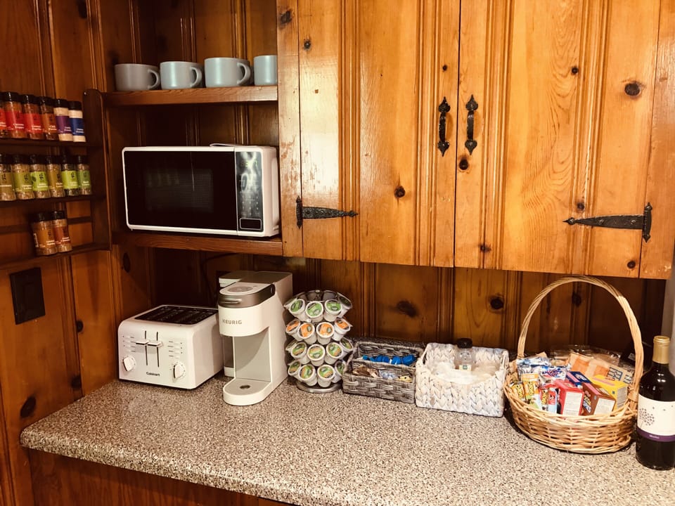 Toaster, microwave, Keurig coffeemaker, coffees, teas, snacks, and more!