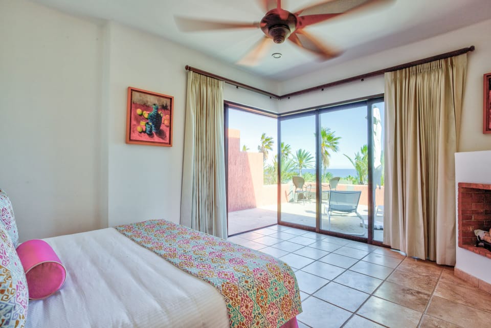 King-size bed and balcony view