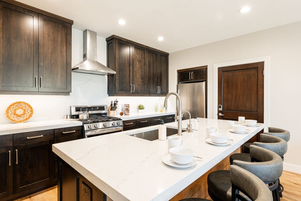 New kitchen with stone counters and new appliances