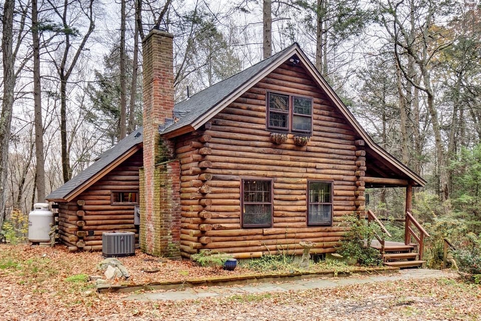 The cabin sits on three private acres overlooking Catlin Brook
