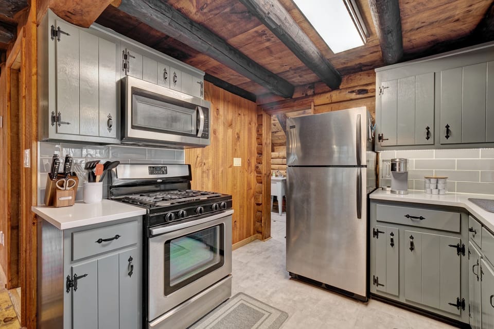 Kitchen includes gas stove/oven and microwave