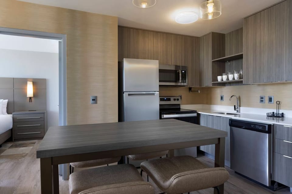 Cook and gather easily with a full kitchen and bar seating.