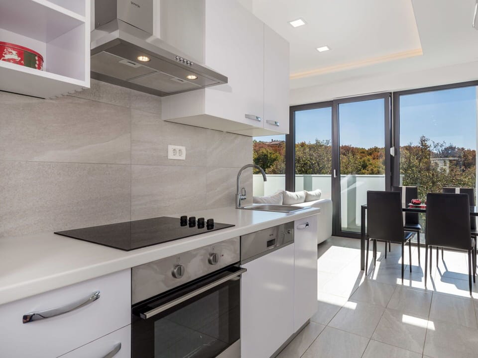 Cabinetry, Tap, Kitchen Sink, Furniture, Building, Countertop, Sink, Kitchen Stove, Kitchen Appliance, Kitchen