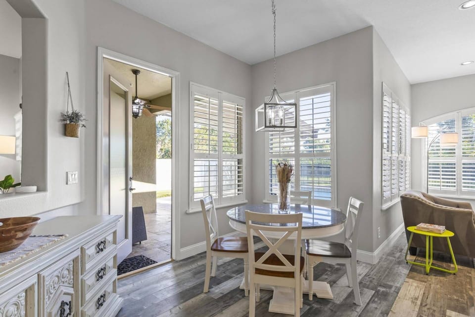 Sophisticated Style: Additional Seating Area Overlooking the Pool