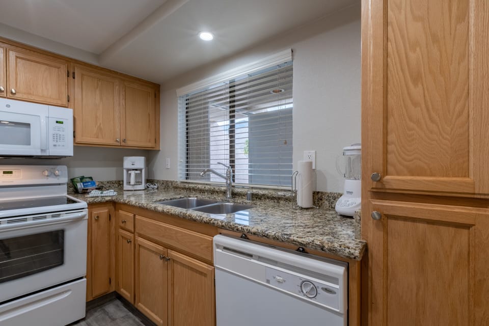 Cook with ease on granite counters and full-size appliances.