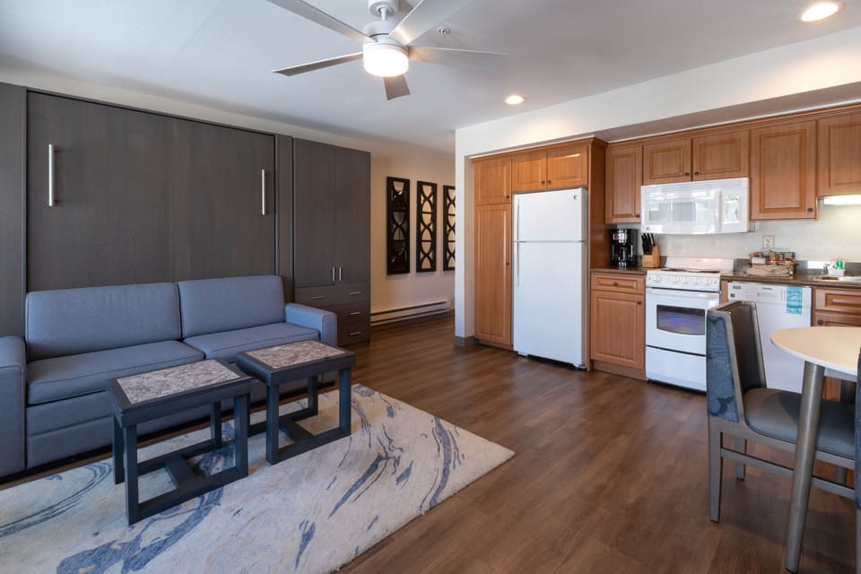 Cook easy meals in the bright kitchenette beside the lounge.