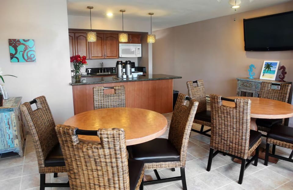 Gather for easy meals with casual seating and kitchenette.