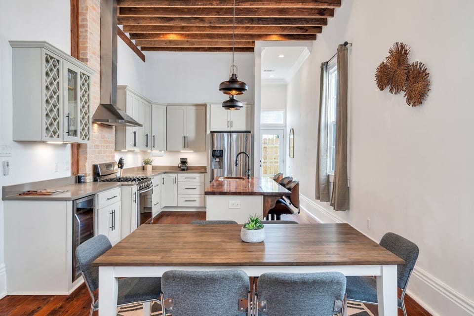 Stylish kitchen w/ pendant lighting & plenty of prep space.
