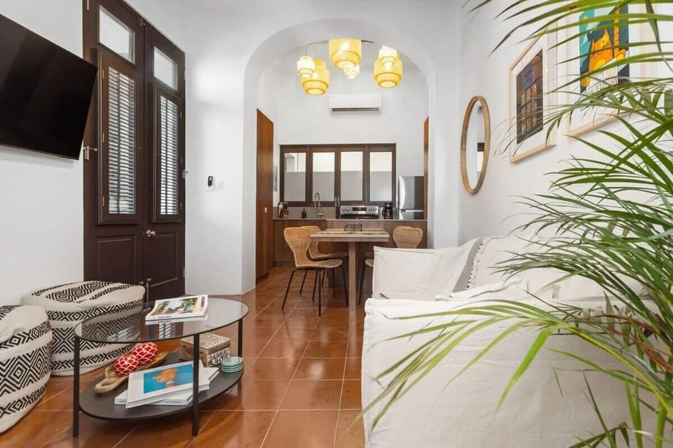 The living areas open up to the outdoor terrace.