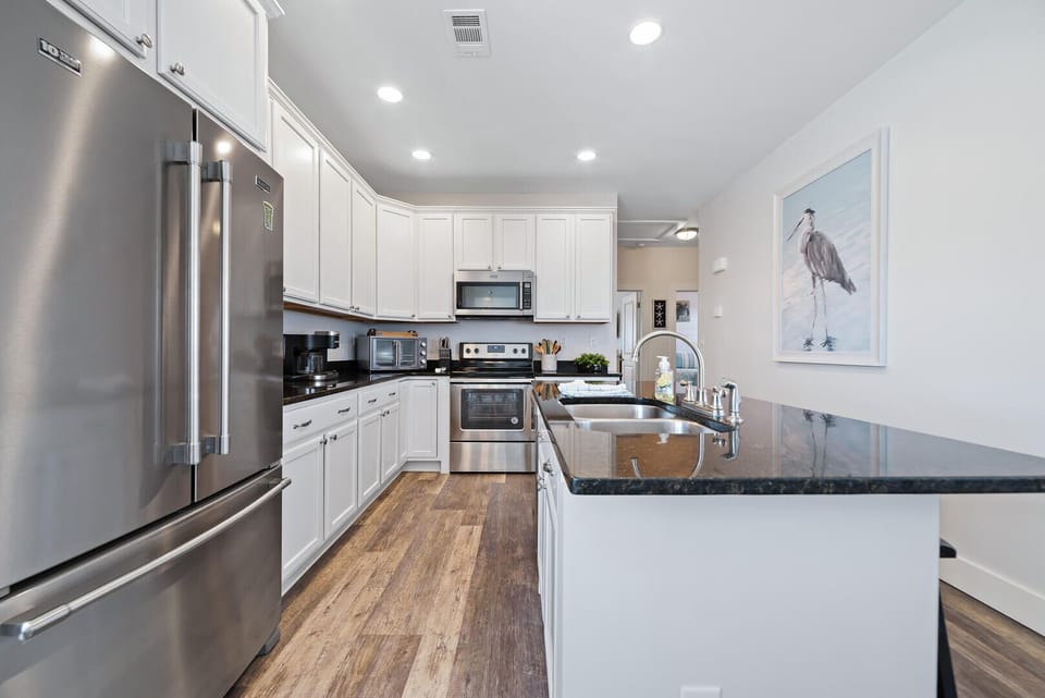 Fully Stocked Kitchen with Granite Countertops & Stainless Appliances