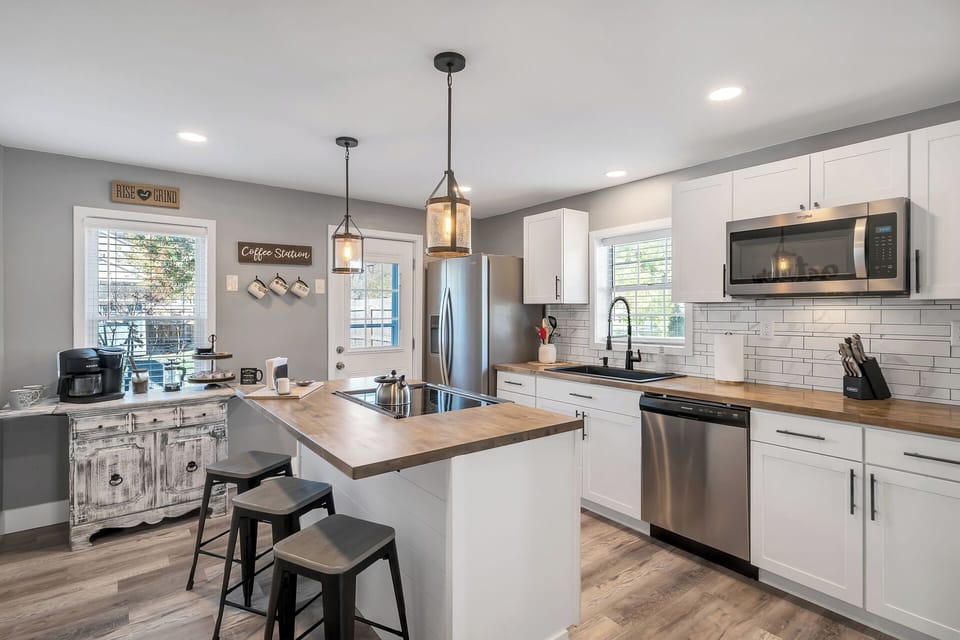 Spacious kitchen with full sized refrigerator, dishwasher, and oven/range!