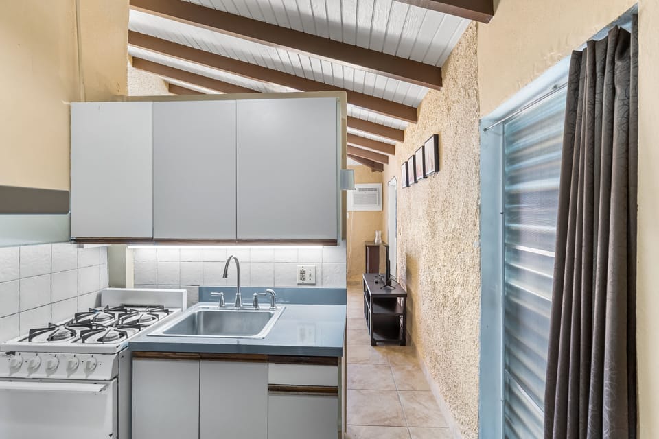 One complete condominium with all the furnishings and comforts. Your balcony overlooks the eighth-foot pool just a few feet from your doorstep. There are restaurants that specialize in local, Latin, and Caribbean food within walking distance—plenty of free onsite parking.