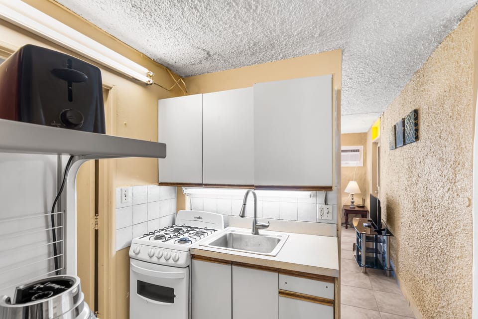 One complete condominium with all the furnishings and comforts. Your balcony overlooks the eighth-foot pool just a few feet from your doorstep. There are restaurants that specialize in local, Latin, and Caribbean food within walking distance—plenty of free onsite parking.
