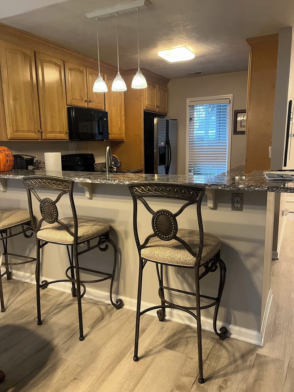 KITCHEN WITH HIGH BAR SEATING