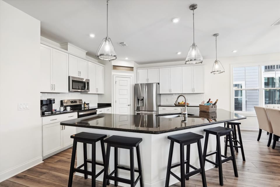 Discover the perfect escape at 3 Talon Court, a new home just a half-mile stroll from the serene Fish Haul Beach, near the historic Mitchellville section.