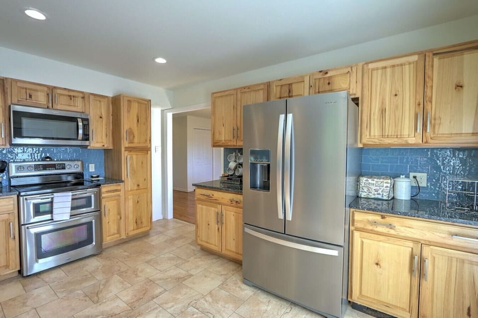 Kitchen with access into dining room