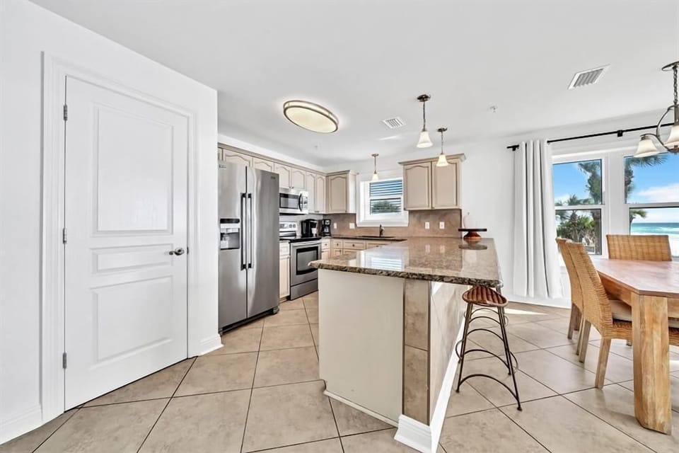 Well equipped kitchen is open to the views too!