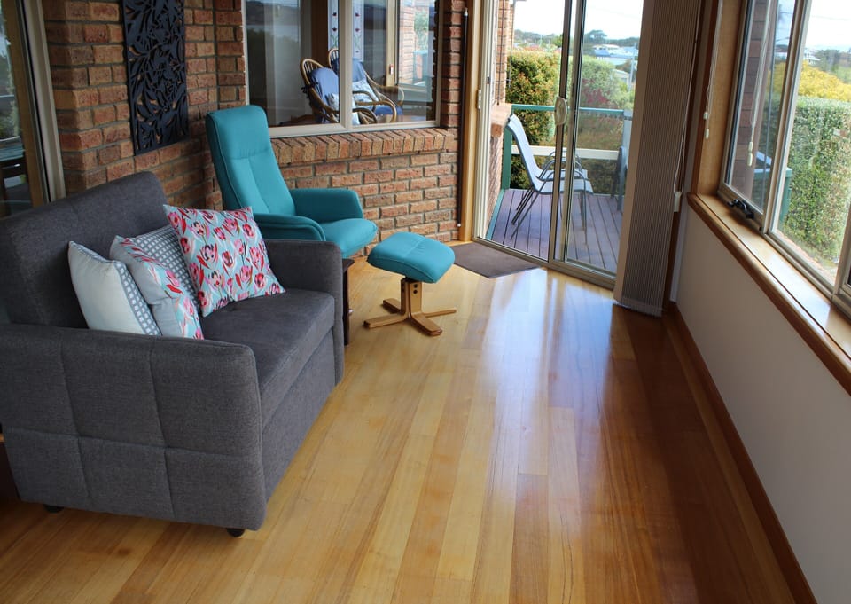 Sunroom with a sofa bed