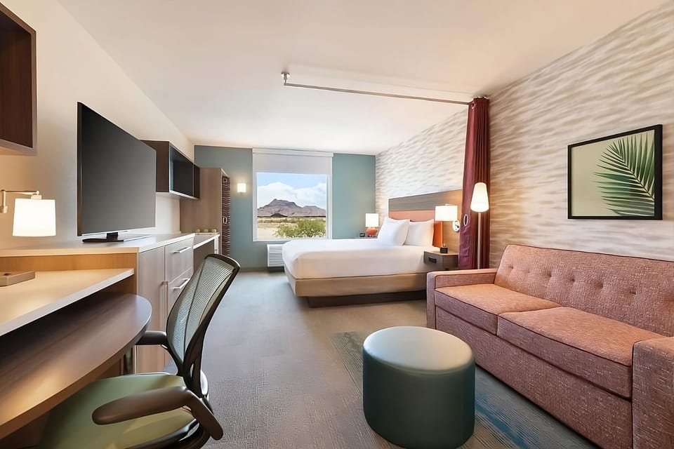 Wake up to mountain views from a bright, plush bed.