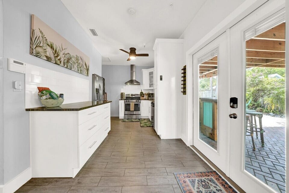 Flora Cottage's kitchen provides enough space for two to three people to prep meals together.