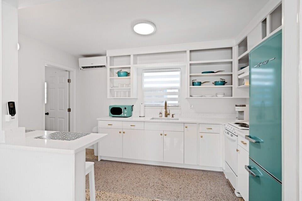 The kitchen has all the amenities needed for a small group.