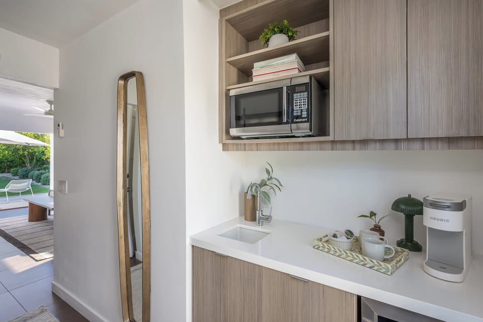 Primary bedroom kitchenette with Keurig K-Mini coffee maker