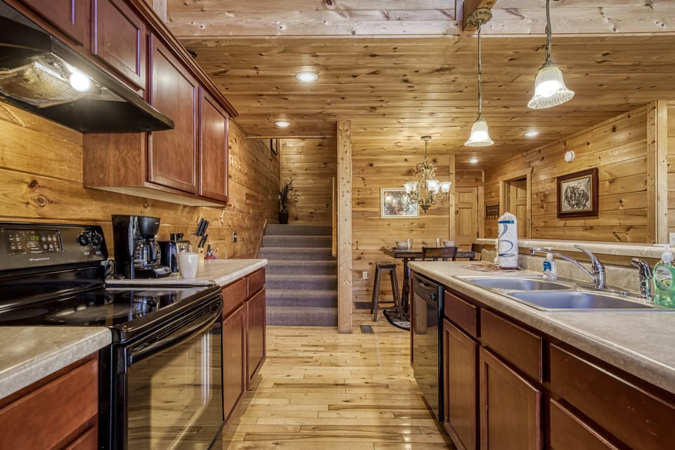 View of kitchen and stairwell up to the next floor - View of kitchen and stairwell up to the next floor