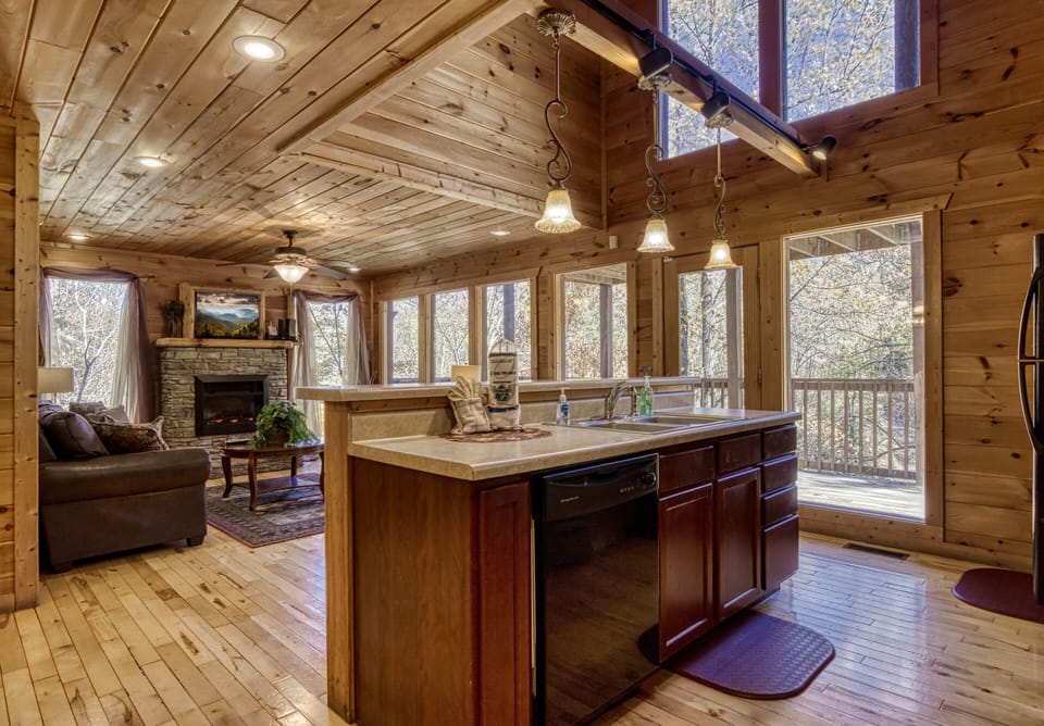 View of kitchen island and living room - View of kitchen island and living room