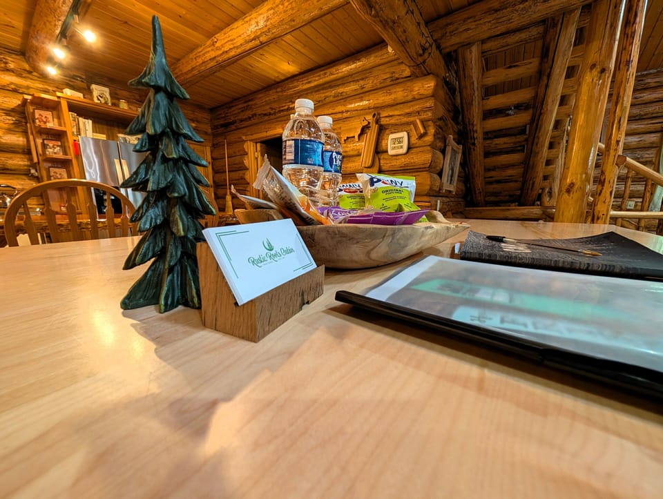 Welcome table with information about the cabin, our contact info and snacks