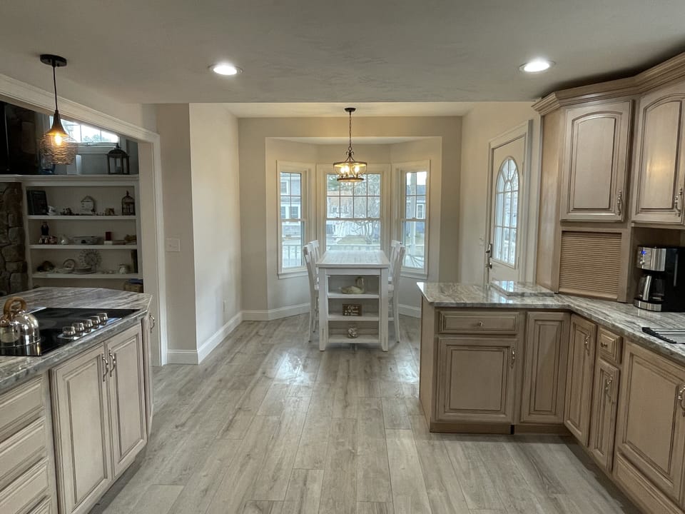 Kitchen table; seating for 4.  One of several dining areas.