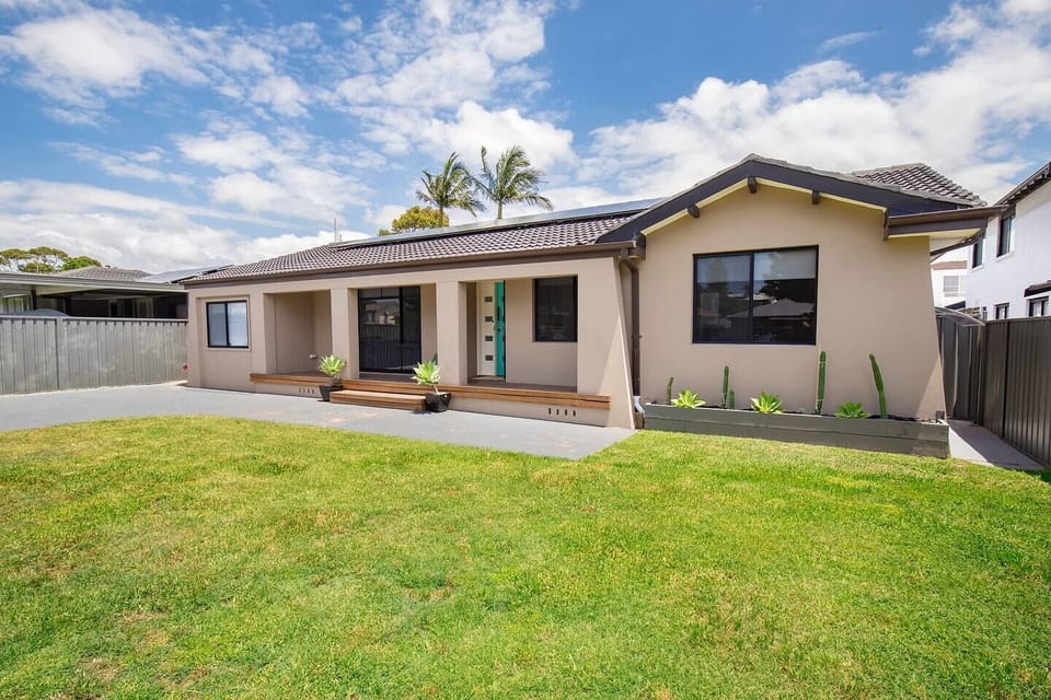 The four-bedroom, single level home is a 15-minute walk to the beach 