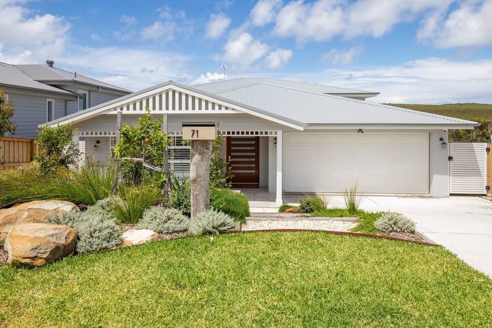 The four-bedroom home is located within the historic seaside village of Catherine Hill Bay.
