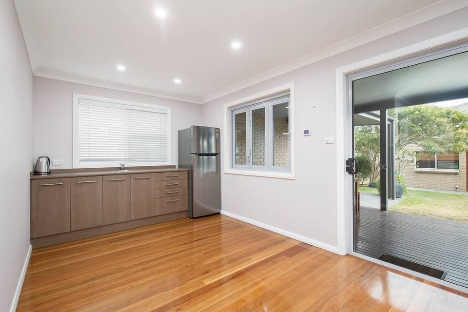 A second kitchen downstairs adds to your daily convenience, opening directly to the back deck.
