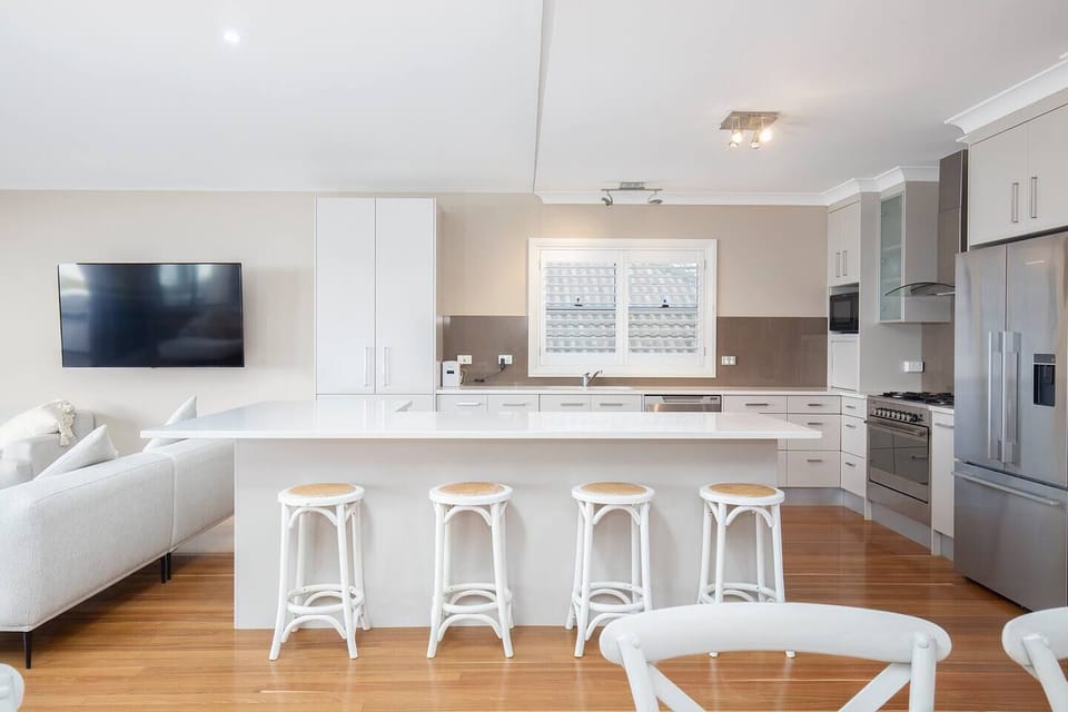 A gourmet kitchen makes it easy to prepare meals, socialise or take things slow up at the breakfast bar.
