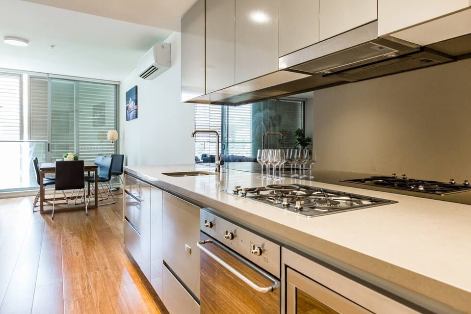 The gourmet kitchen includes modern appliances and is fully equipped with everything you need to whip up a delicious meal.
