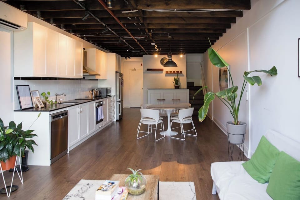 The gourmet open-plan kitchen includes a state-of-the-art fitout with all the appliances and utensils needed to create a home-cooked meal.