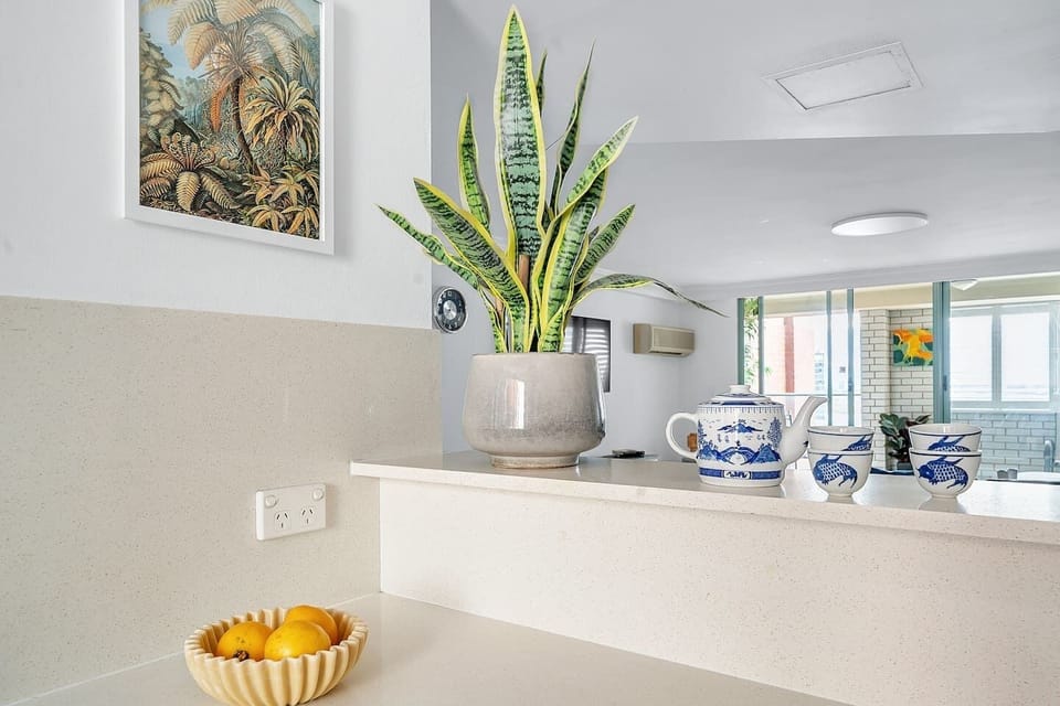 The kitchen has an open view to the living and dining space, perfect for entertaining.