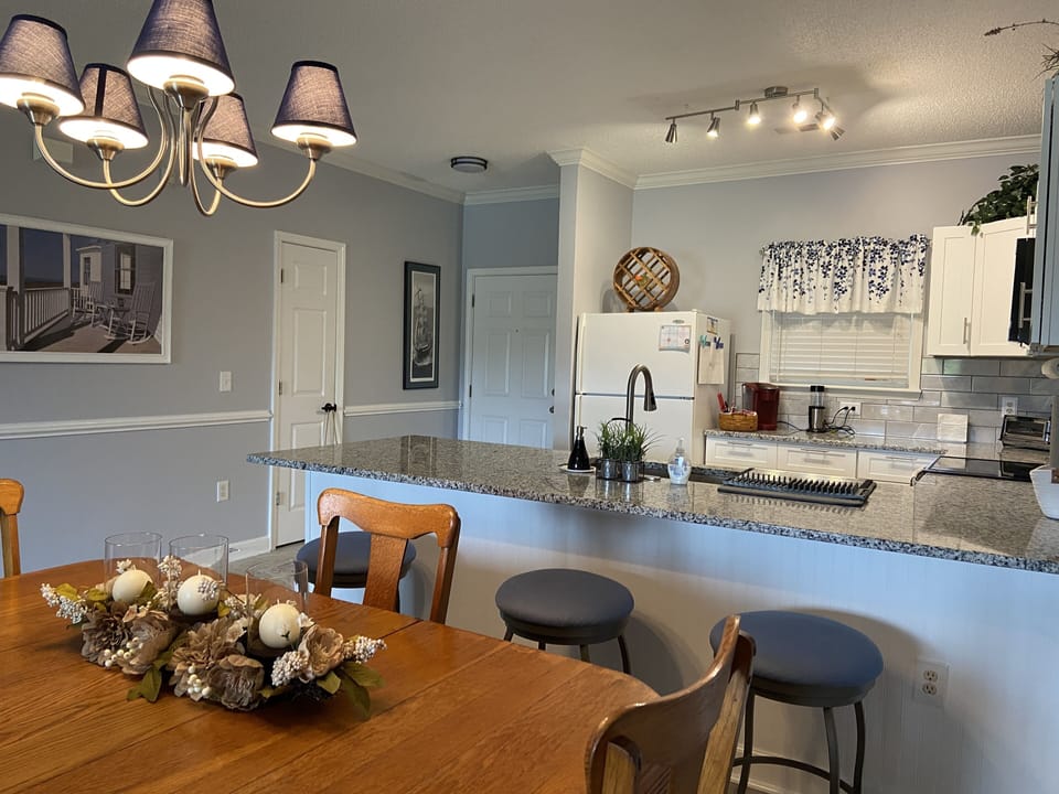 Beautiful table and new kitchen.