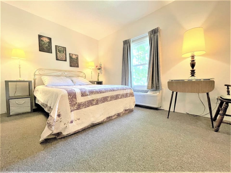 Queen bed with a view plus workspace