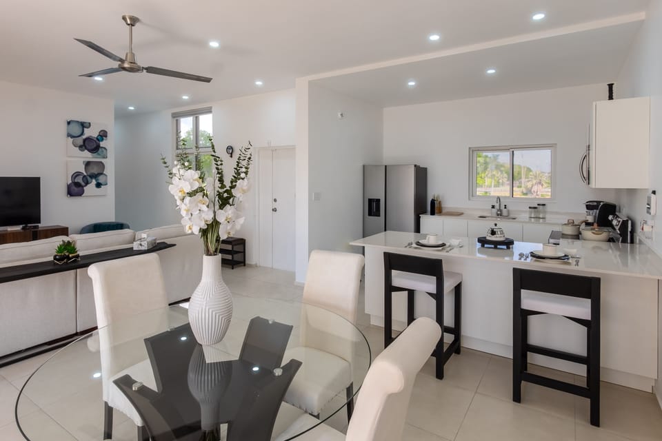 Kitchen equipped with Samsung large appliances, and an array of small appliances