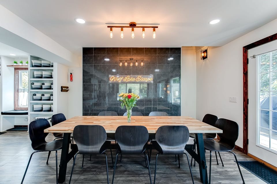 Serve your delicious meals easily at the dining table next to the WLE sign.