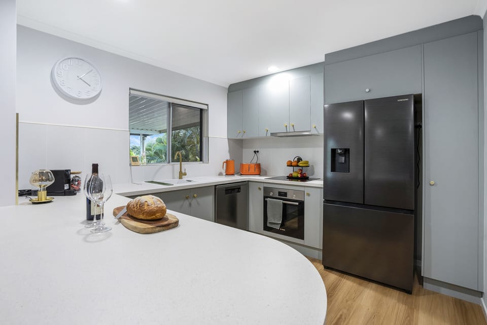 Kitchen with coffee machine