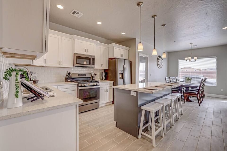 Large open kitchen and living room for families and friends to be together.