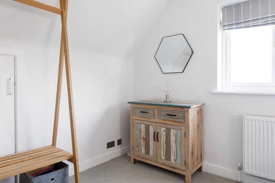 There are drawers and hanging space for your belongings.