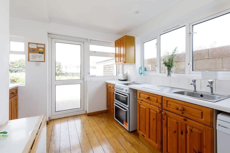 The kitchen has a dishwasher, oven, hob and other modern appliances to make cooking up a storm easy!