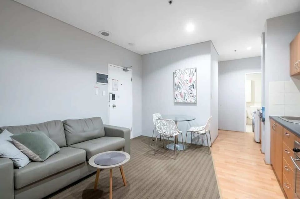 Living space with dining table and second TV