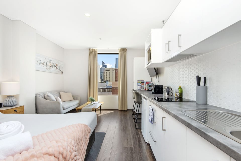 Mini fridge & microwave along with basic kitchenette facilities, toaster, kettle & coffee machine